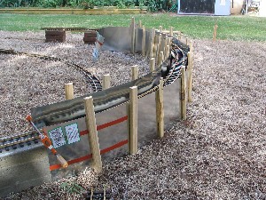 Forms used to pour a curved section of track base